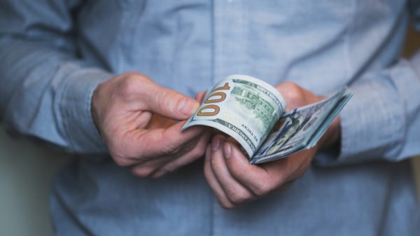 Businessman holding money in his hands