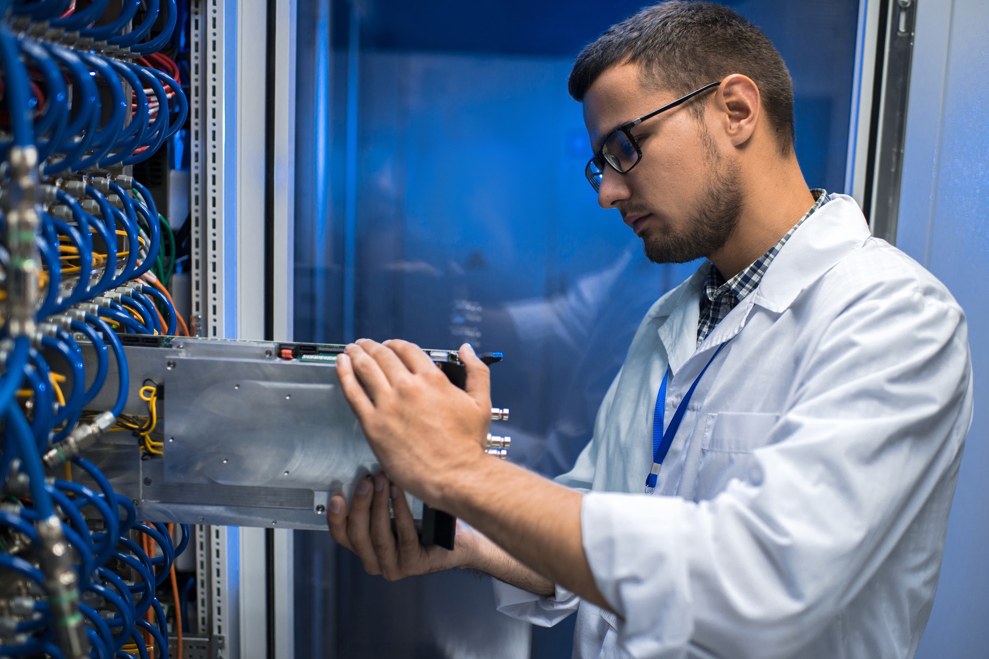 IT Scientist Working with Supercomputer