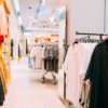 Many Male One-colour T-shirt On Hanger In Store Of Shopping Cent