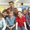 Schoolchildren In classroom with teacher