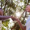 African And Caucasian Boys Joining Hands Against Racism