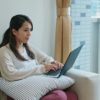 Woman work on computer at home