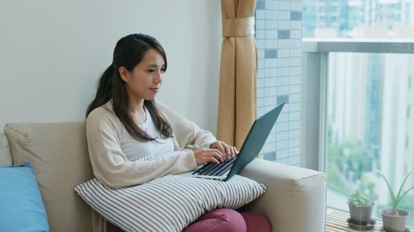 Woman work on computer at home